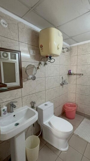 Bathroom in 2.5 BHK Apartment at Gulshan Botnia, Sector 144 – for Rent