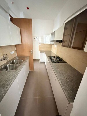 Kitchen in 3 BHK Apartment at Puri Emerald Bay, Sector 104 – for Sale