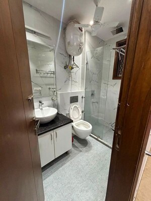 Bathroom in 2 BHK Builder Floor at Kalkaji – for Rent