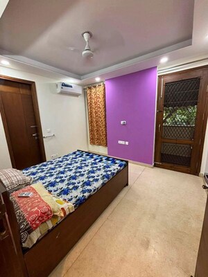 Bedroom in 2 BHK Builder Floor at Kalkaji – for Rent