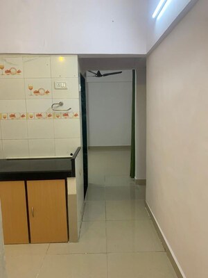 Kitchen in 1 BHK Apartment at Green Fields Apartment, Andheri East – for Rent