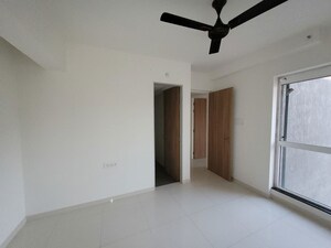 Room in 2 BHK Apartment at Godrej Emerald, Ghodbunder Road – for Rent
