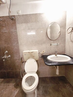 Bathroom in 3 BHK Apartment at Kolte Patil Margosa Heights, Mohammadwadi – for Rent