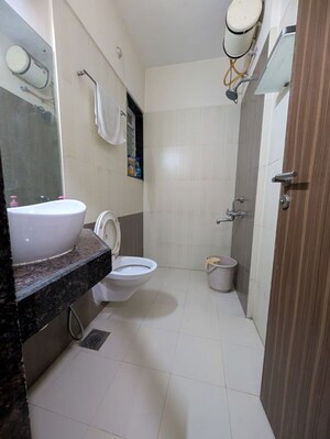 Bathroom in 2 BHK Apartment at Rustomjee Urbania Acura, Thane West – for Rent