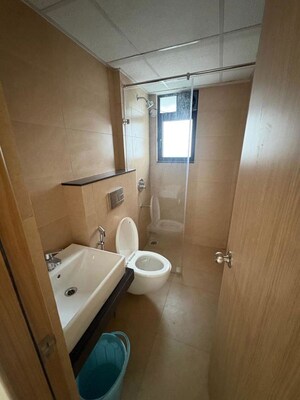 Bathroom in 3 BHK Apartment at Mahindra Nestalgia, Pimpri – for Rent