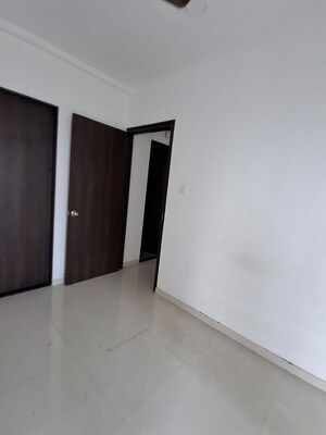 Room in 2 BHK Apartment at UK Iridium, Kandivali East – for Rent