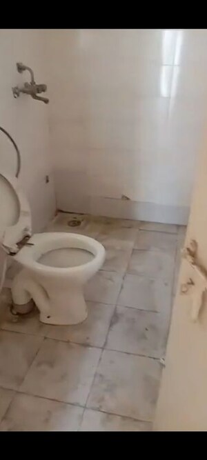 Bathroom in 2 BHK Apartment at Auric Happy Homes, Sector 86 – for Sale