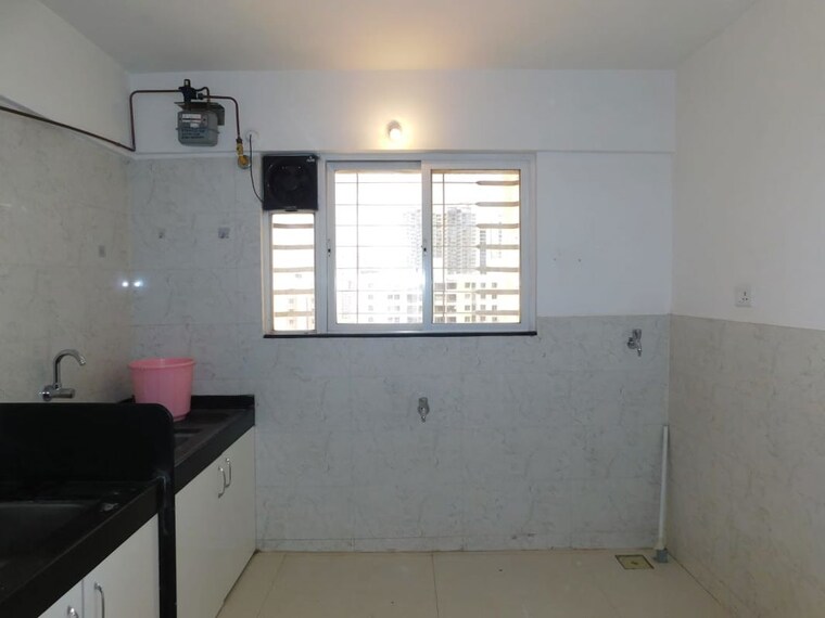 Kitchen, gk-atlanta-phase-2 2 Bedroom 850 Sq.Ft. Apartment In Wakad Pune 10560246