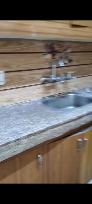 Kitchen in 3 BHK Apartment at Arun Vihar Sector 37, Sector 37 – for Sale