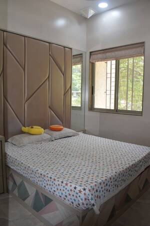 Bedroom in 2 BHK Apartment at Lodha Grandezza, Wagle Industrial Estate – for Rent