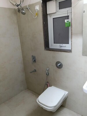 Bathroom in 2 BHK Apartment at Puranik City, Kasarvadavali – for Rent