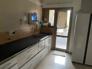 Kitchen in  Apartment at Prahlad Nagar – for Rent