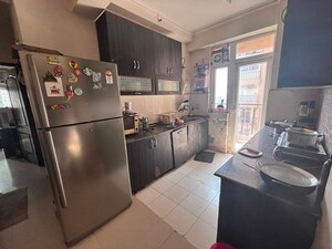 Kitchen in 1 BHK Apartment at Paramount Emotions, Sector 1 Greater Noida – for Rent