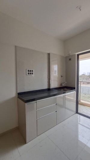Kitchen in Studio Apartment at Bramha Boulevard, Camp – for Rent