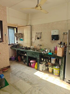 Kitchen in 2 BHK Apartment at Indradhanu Palace Chs, Uthalsar – for Sale