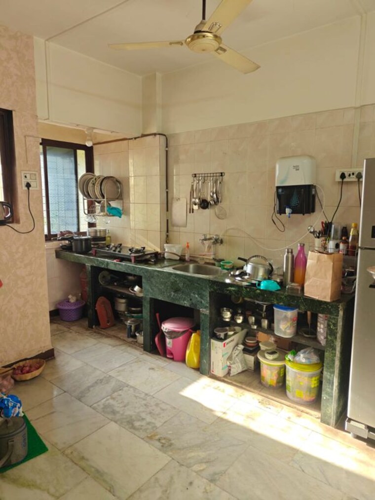 Kitchen, indradhanu-palace-chs 2 Bedroom 910 Sq.Ft. Apartment In Uthalsar Thane 10560418