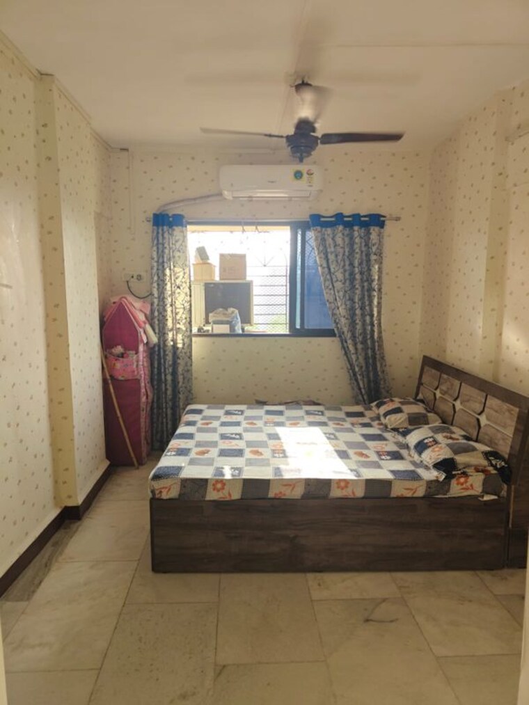 Bedroom, indradhanu-palace-chs 2 Bedroom 910 Sq.Ft. Apartment In Uthalsar Thane 10560418