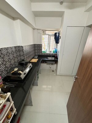 Kitchen in 1.5 BHK Apartment at Lodha Amara, Kolshet Road – for Rent