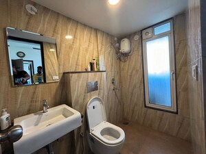 Bathroom in 1.5 BHK Apartment at Lodha Amara, Kolshet Road – for Rent