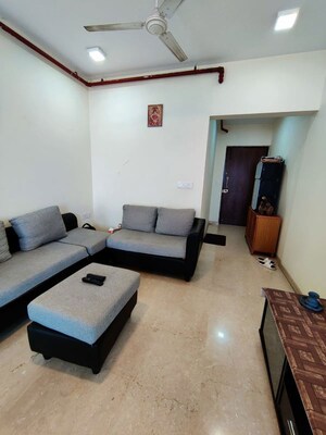 Living Room in 2 BHK Apartment at Omkar Ananta, Goregaon East – for Rent