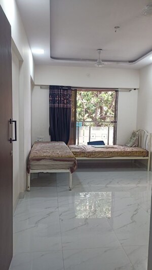 Bedroom in 1 BHK Builder Floor at Kandivali West – for Rent