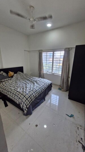 Bedroom in 2.5 BHK Apartment at Prescon Midtown Bay, Mahim West – for Rent