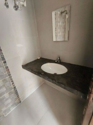 Bathroom in 2 BHK Apartment at Kesar Symphony, Kharghar – for Rent