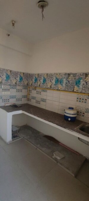 Kitchen in 2.5 BHK Apartment at Mahagun My Woods, Sector 16c Greater Noida – for Rent