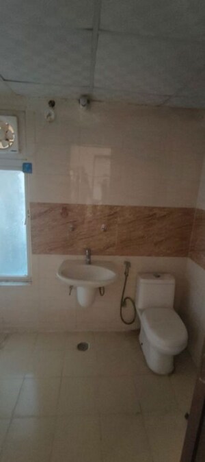 Bathroom in 2.5 BHK Apartment at Mahagun My Woods, Sector 16c Greater Noida – for Rent