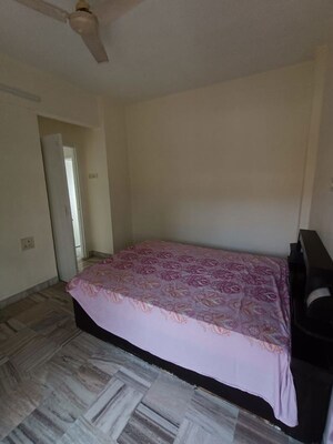 Bedroom in 2 BHK Apartment at Omkar Alta Monte, Malad East – for Rent