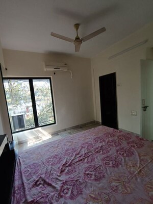 Bedroom in 2 BHK Apartment at Omkar Alta Monte, Malad East – for Rent