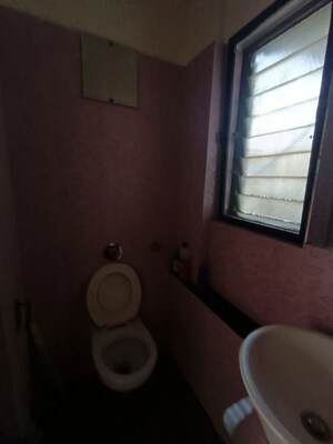 Bathroom in 2 BHK Apartment at Omkar Alta Monte, Malad East – for Rent