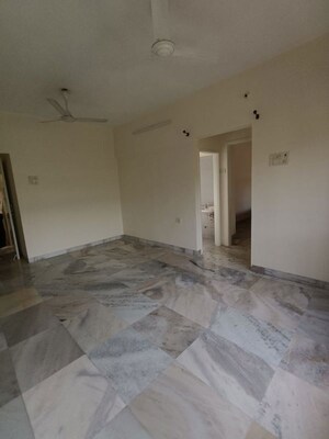 Room in 2 BHK Apartment at Omkar Alta Monte, Malad East – for Rent