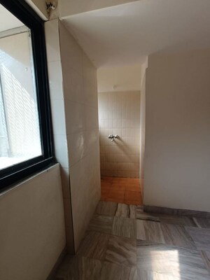 Bathroom in 2 BHK Apartment at Omkar Alta Monte, Malad East – for Rent