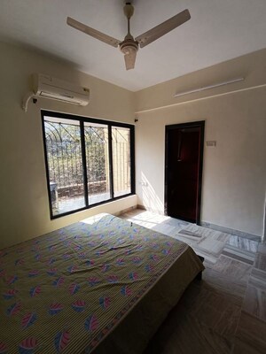 Bedroom in 2 BHK Apartment at Omkar Alta Monte, Malad East – for Rent