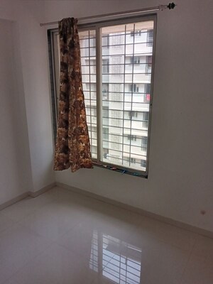 Room in 2 BHK Apartment at Shree Nidhi, Lohgaon – for Rent