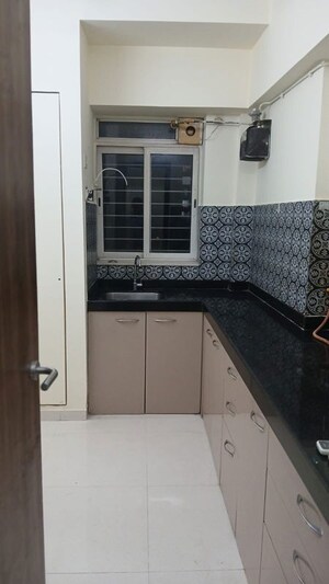 Kitchen in 2 BHK Apartment at Puranik City, Kasarvadavali – for Rent