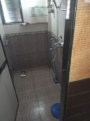 Bathroom in 2 BHK Apartment at Rajhem JVLR 60, Andheri East – for Rent
