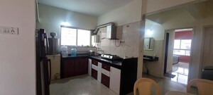 Kitchen in 3 BHK Apartment at G K Daffodils Housing Society, Pimple Saudagar – for Rent