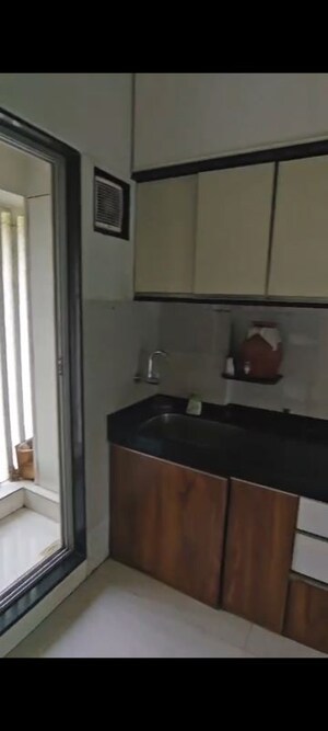 Bathroom in 2 BHK Apartment at Jeevan Sarita CHS, Vile Parle East – for Rent