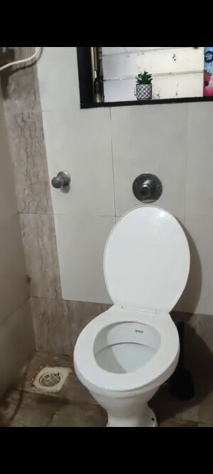 Bathroom in 2 BHK Apartment at Air View Apartment, Vile Parle East – for Rent