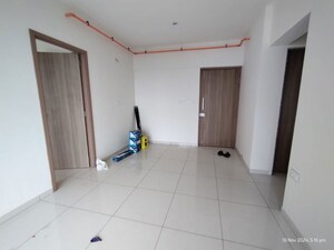 Building Lobby in 1 BHK Apartment at Godrej Nirvaan, Themghar – for Rent