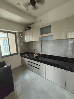 Kitchen in 2 BHK Apartment at Sheth Auris Bliss, Malad West – for Rent