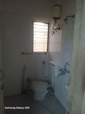 Bathroom in 2 BHK Apartment at Nagari Niwara CHS, Goregaon East – for Rent