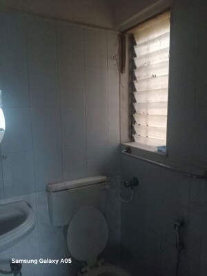 Bathroom in 2 BHK Apartment at Nagari Niwara CHS, Goregaon East – for Rent