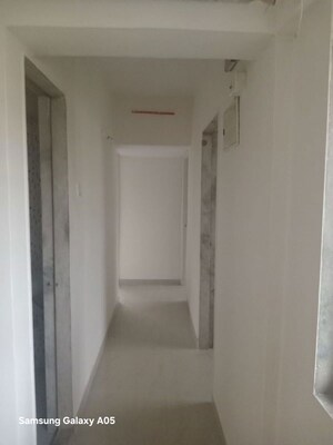 Building Lobby in 2 BHK Apartment at Nagari Niwara CHS, Goregaon East – for Rent