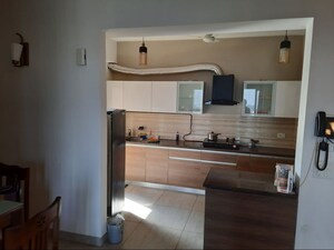 Kitchen in 3 BHK Apartment at ABA Cleo County, Sector 121 – for Rent
