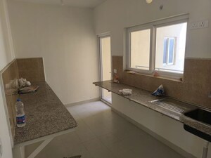 Kitchen in 3 BHK Apartment at Pardos Okas Residency, Sushant Golf City – for Rent