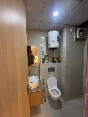 Bathroom in Studio Apartment at Kaveri City Center, Delta I Greater Noida – for Rent