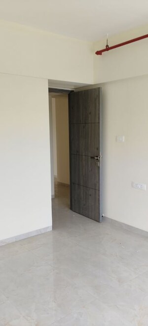 Room in 2 BHK Apartment at IM Applaud 38, Goregaon East – for Rent